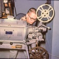 Dave Wilson, Bell & Howell arc 16MM projector, probably projecting "Bridge To The Future".